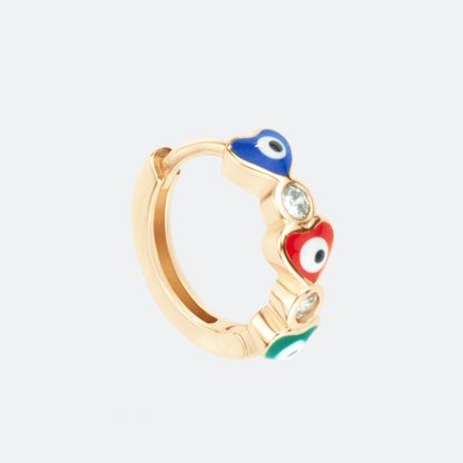 The Amor hoop earring by Ocarina, an 18K gold-plated design featuring colorful enamel heart-shaped evil eyes and sparkling zircon stones. A playful and symbolic jewelry piece for protection and love, displayed against a clean white background.