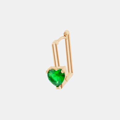 The Viridis hoop earring by Ocarina, an 18K gold-plated geometric square design featuring a striking prong-set green gemstone. A modern and bold jewelry piece combining structure and elegance, displayed against a clean white background.
